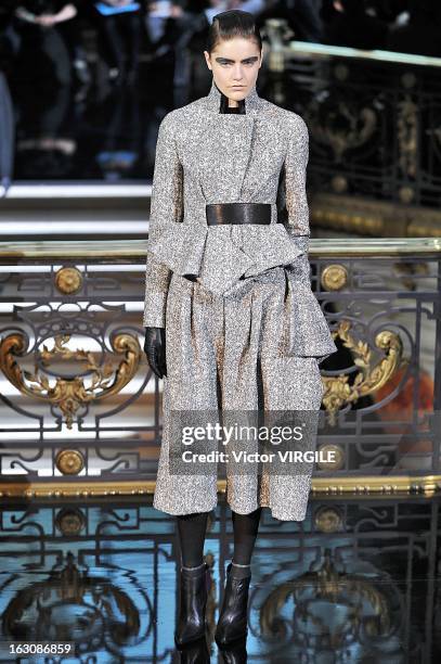 Model walks the runway during the John Galliano Fall/Winter 2013 Ready-to-Wear show as part of Paris Fashion Week at Le Centorial on March 3, 2013 in...