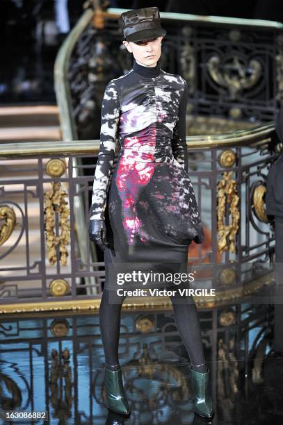 Model walks the runway during the John Galliano Fall/Winter 2013 Ready-to-Wear show as part of Paris Fashion Week at Le Centorial on March 3, 2013 in...