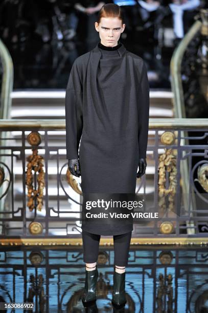 Model walks the runway during the John Galliano Fall/Winter 2013 Ready-to-Wear show as part of Paris Fashion Week at Le Centorial on March 3, 2013 in...