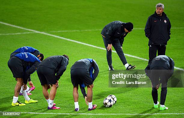 Head coach Mircea Lucescu looks on during a FC Shakhtar Donetsk training session ahead of their UEFA Champions League round of 16 match against...