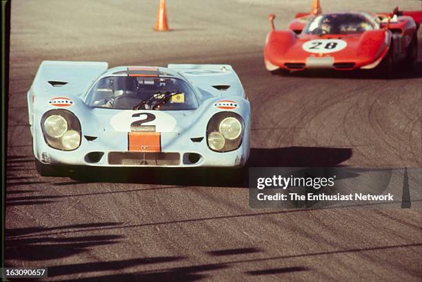 Daytona 24 Hour Race. He number two Gulf-Porsche 917K driven by Pedro Rodriguez; Leo Kinnunen and Brian Redman leads the Ferrari 512S of Mario...