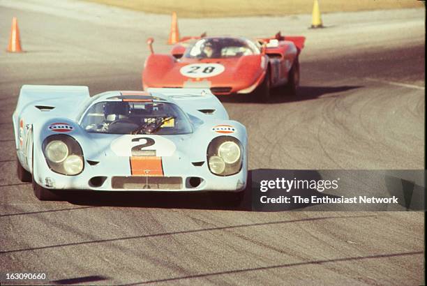 Daytona 24 Hour Race. The number two Gulf-Porsche 917K driven by Pedro Rodriguez; Leo Kinnunen and Brian Redman leads the Ferrari 512S of Mario...