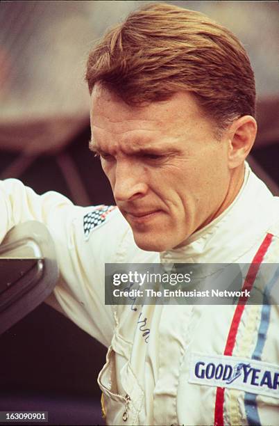 Monterey Grand Prix - Laguna Seca - Can-Am. AAR founder and driver Dan Gurney stands by the paddock. Gurney would qualify his his Chevrolet powered...