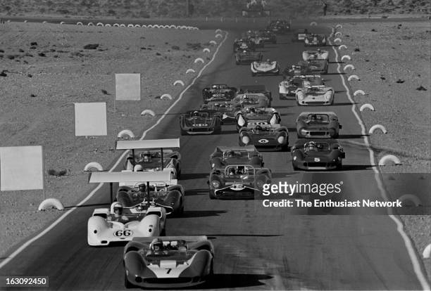 Stardust Grand Prix - Can-Am - Las Vegas. The racing field drives down a straightaway.