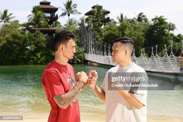 Opponents Max Holloway and 'The Korean Zombie' Chan Sung Jung of South Korea face off ahead of their fight at Sentosa Resort on August 22, 2023 in...