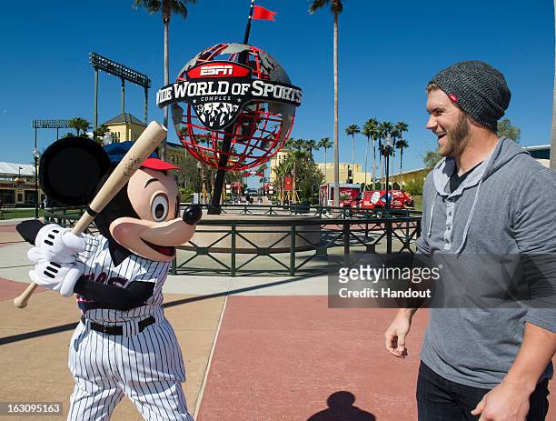 In this handout image provided by Disney Parks, reigning National League Rookie of the Year Bryce Harper of the Washington Nationals poses with...