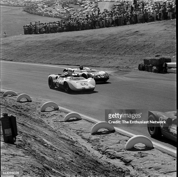 Times Grand Prix - Riverside International Raceway. Hap Sharp in the Chaparral fights off Dan Gurney in the Pacesetter Homes Ford-powered Lotus 19...