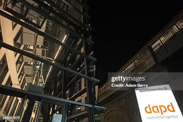 Regional train passes above the offices of the German news agency dapd on March 4, 2013 in Berlin, Germany. The country's second-largest news agency,...