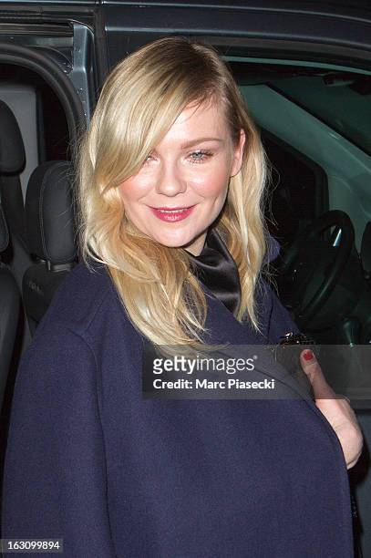 Actress Kirsten Dunst arrives to attend the 'Saint Laurent' Fall/Winter 2013 Ready-to-Wear show as part of Paris Fashion Week on March 4, 2013 in...
