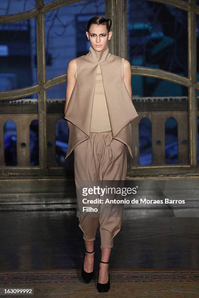Model walks the runway during the Amaya Arzuaga Fall/Winter 2013 Ready-to-Wear show as part of Paris Fashion Week on March 4, 2013 in Paris, France.