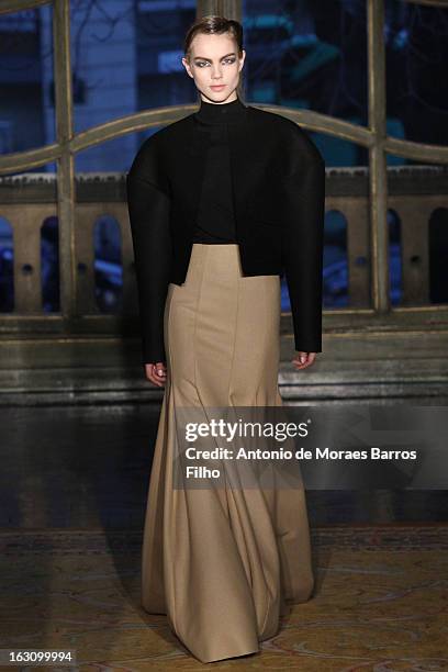 Model walks the runway during the Amaya Arzuaga Fall/Winter 2013 Ready-to-Wear show as part of Paris Fashion Week on March 4, 2013 in Paris, France.