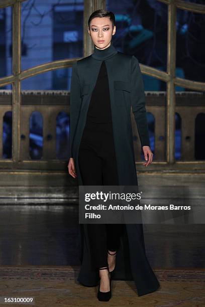 Model walks the runway during the Amaya Arzuaga Fall/Winter 2013 Ready-to-Wear show as part of Paris Fashion Week on March 4, 2013 in Paris, France.