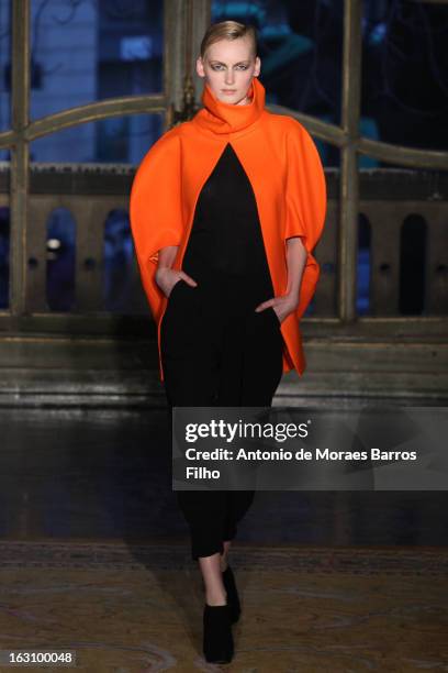 Model walks the runway during the Amaya Arzuaga Fall/Winter 2013 Ready-to-Wear show as part of Paris Fashion Week on March 4, 2013 in Paris, France.