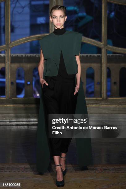 Model walks the runway during the Amaya Arzuaga Fall/Winter 2013 Ready-to-Wear show as part of Paris Fashion Week on March 4, 2013 in Paris, France.