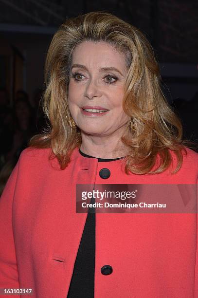 Catherine Deneuve attends the Saint Laurent Fall/Winter 2013 Ready-to-Wear show as part of Paris Fashion Week on March 4, 2013 in Paris, France.