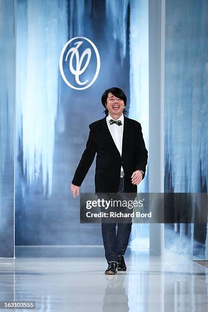 Designer Valentin Yudashkin walks the runway during the Valentin Yudashkin Fall/Winter 2013 Ready-to-Wear show as part of Paris Fashion Week at Hotel...