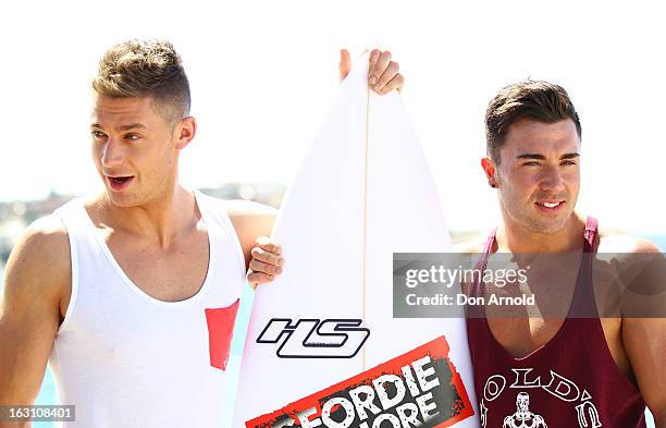 Scott Timlin and James Tindale, of UK reality TV series, Geordie Shore, poses for a photo at Bondi Beach on March 5, 2013 in Sydney, Australia.