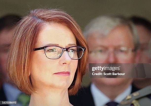 Prime Minister of Australia Julia Gillard and former Prime Minister of Australia Kevin Rudd look on as they leave the State Funeral for former...