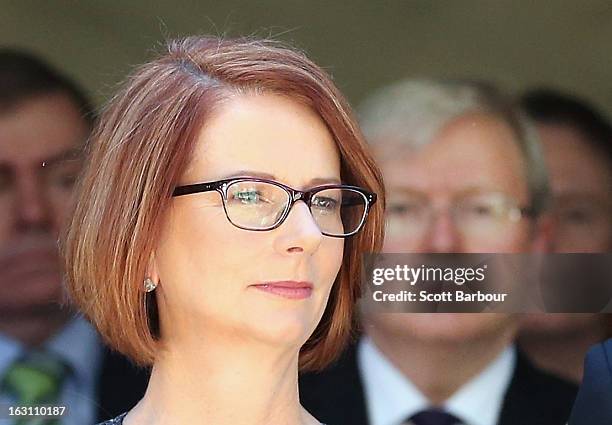 Prime Minister of Australia Julia Gillard and former Prime Minister of Australia Kevin Rudd look on as they leave the State Funeral for former...