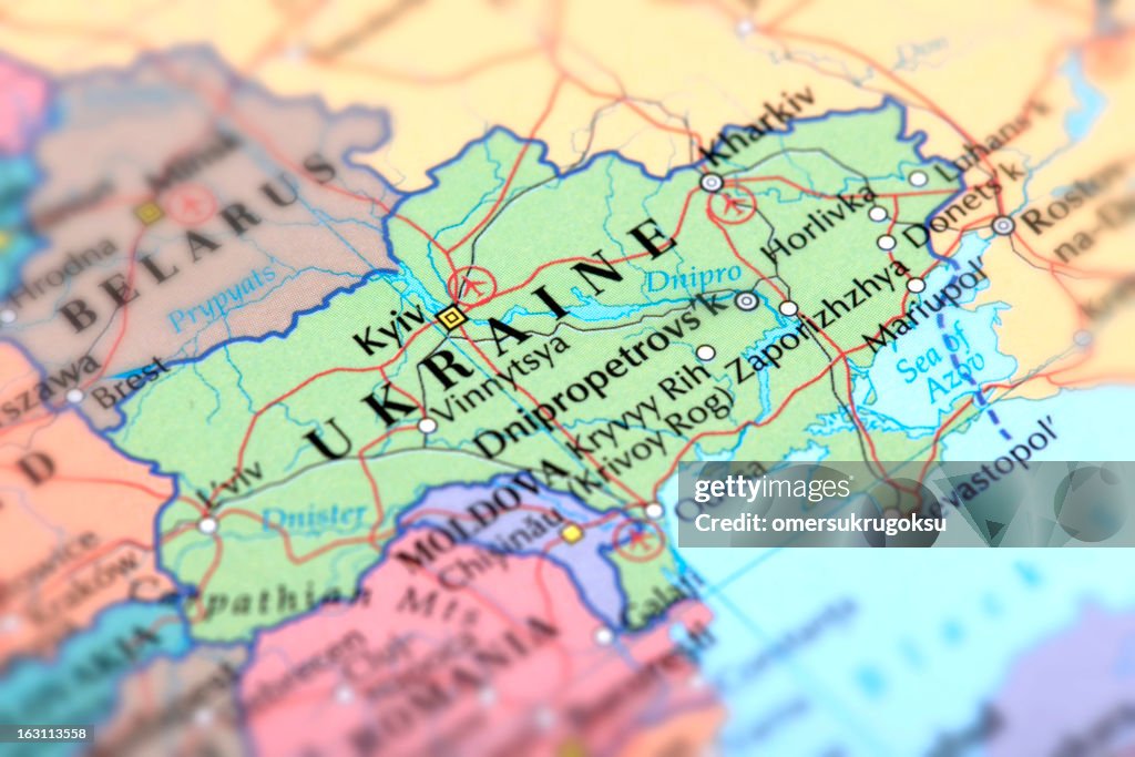 Map of green Ukraine on a globe