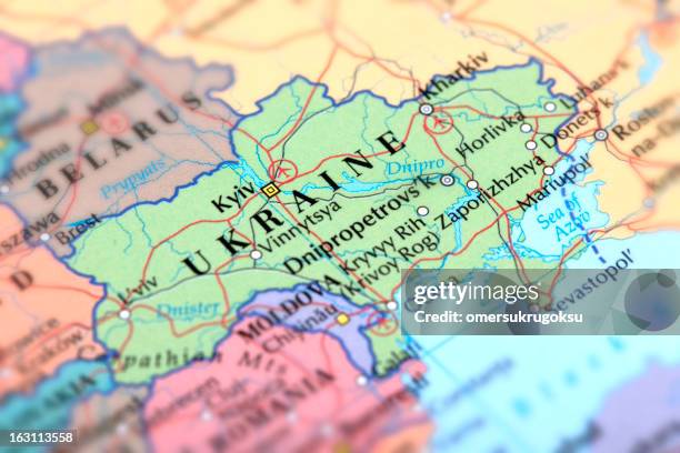 map of green ukraine on a globe - map of ukraine cities stock pictures, royalty-free photos & images