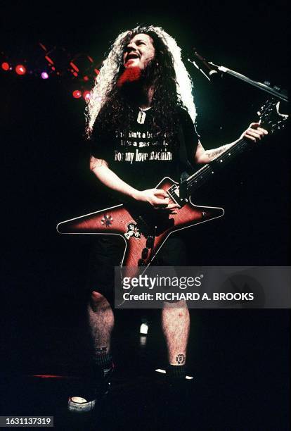 This May 1994 photo shows guitarist Darrell "Dimebag" Abbott of the US heavy metal band Pantera in concert at Kosei Nenkin Hall in Tokyo, Japan. Five...
