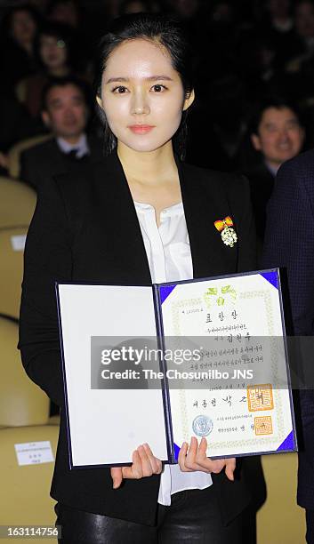 Han Ga-In is awarded the Presidential Citation during the 27th Taxpayer Day at COEX Auditorium on March 4, 2013 in Seoul, South Korea.