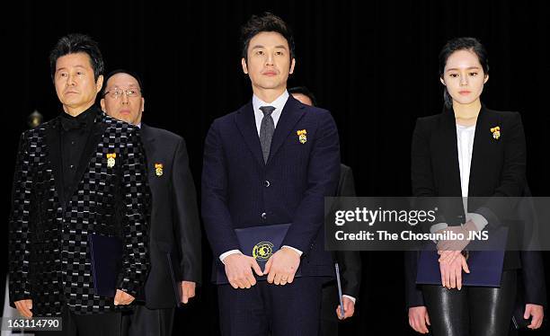 Tae Jin-A, Uhm Tae-Woong and Han Ga-In are awarded the Presidential Citation during the 27th Taxpayer Day at COEX Auditorium on March 4, 2013 in...