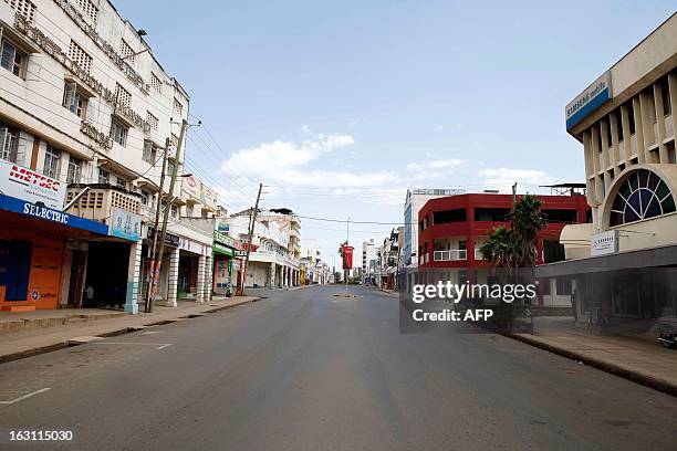 Lonely road pictured in the centre of Kisumu afer all business were closed on election dayin Kisumu, western Kenyaon March 4, 2013. Long lines of...