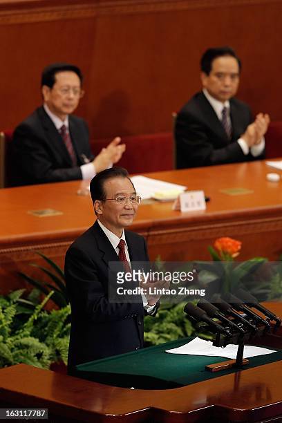 Chinese Premier Wen Jiabao delivers the work report at the opening session of the annual National People's Congress at Great Hall of the People on...