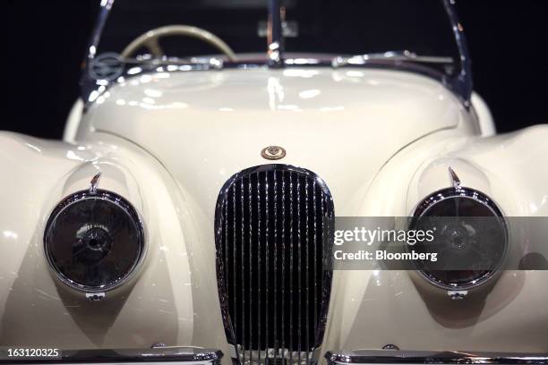 The front grill of a classic Jaguar automobile is seen on the company's stand on the first day of the 83rd Geneva International Motor Show in Geneva,...