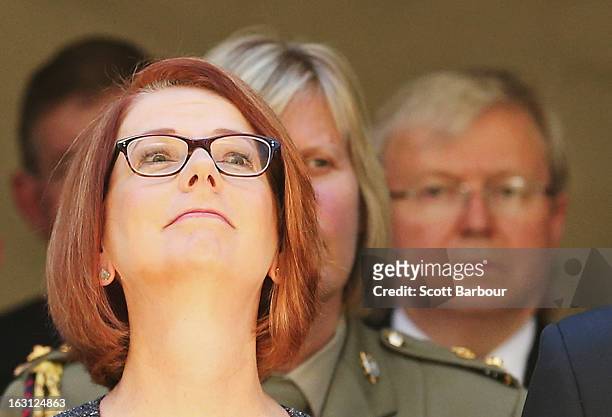 Prime Minister of Australia Julia Gillard and former Prime Minister of Australia Kevin Rudd look on as they leave the State Funeral for former...