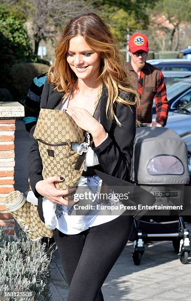 Spanish football player Jose Maria Gutierrez 'Guti''s girlfriend Romina Belluscio and her son Enzo are seen on February 20, 2013 in Madrid, Spain.