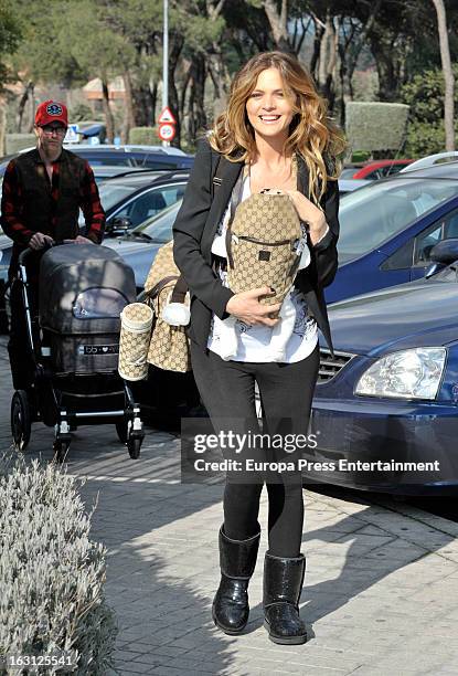 Spanish football player Jose Maria Gutierrez 'Guti''s girlfriend Romina Belluscio and her son Enzo are seen on February 20, 2013 in Madrid, Spain.