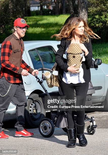 Spanish football player Jose Maria Gutierrez 'Guti', his girlfriend Romina Belluscio and their son Enzo are seen on February 20, 2013 in Madrid,...