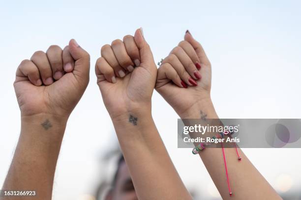 During the Virgin Mary Festival in Dronka, Coptic Christians shows the cross tattooed on their right hands, a distinctive symbol embraced by the...