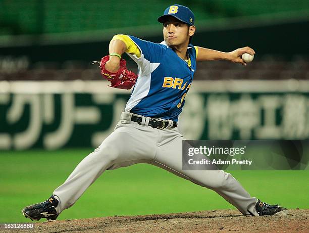 Pitcher Hugo Kanabushi of Brazil pitches during the World Baseball Classic First Round Group A game between China and Brazil at Fukuoka Yahoo! Japan...