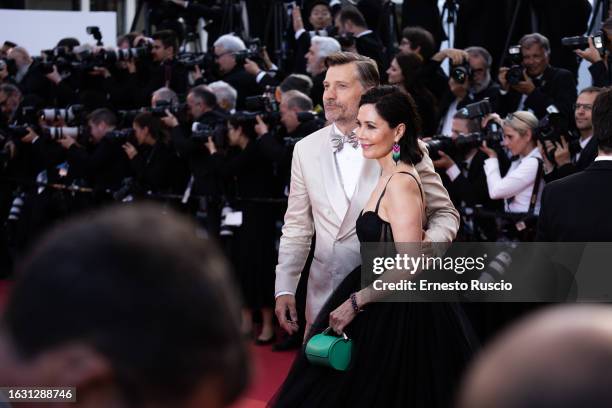 Nikolaj Coster-Waldau and Nukâka Coster-Waldau attend the "Elemental" screening and closing ceremony red carpet during the 76th annual Cannes film...