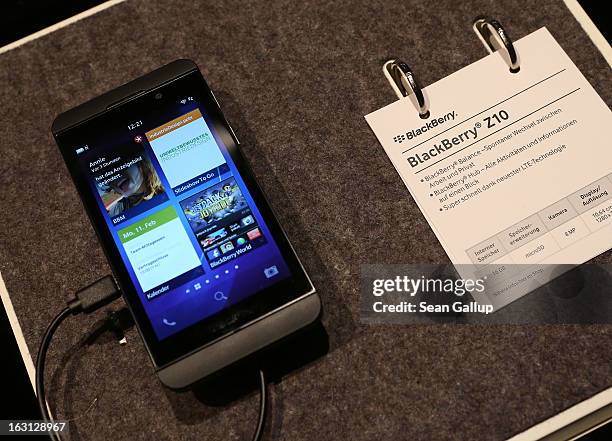 Blackberry Z10 smartphone, which is the Germany version of the Blackberry 10, lies on display at the Vodafone stand at the 2013 CeBIT technology...