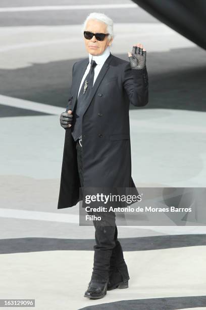 Karl Lagerfeld walks the runway during the Chanel Fall/Winter 2013 Ready-to-Wear show as part of Paris Fashion Week at Grand Palais on March 5, 2013...