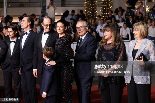 Fausto Russo Alesi, Barbara Ronchi and Marco Bellocchio attend the "Rapito " red carpet during the 76th annual Cannes film festival at Palais des...