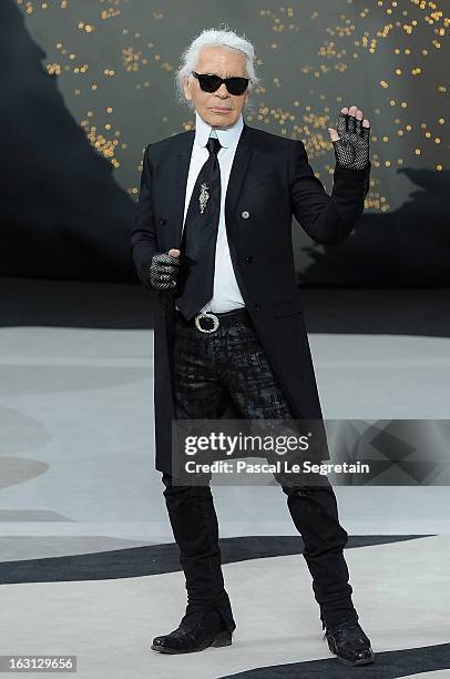 Fashion designer Karl Lagerfeld acknowledges applause following Chanel Fall/Winter 2013 Ready-to-Wear show as part of Paris Fashion Week at Grand...