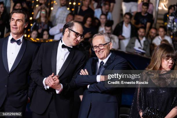 Fausto Russo Alesi and Marco Bellocchio attend the "Rapito " red carpet during the 76th annual Cannes film festival at Palais des Festivals on May...