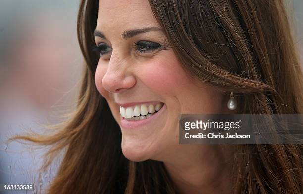 Catherine, Duchess of Cambridge arrives at Havelock Academy on March 5, 2013 in Grimsby, England. The pregnant Duchess of Cambridge is spending the...
