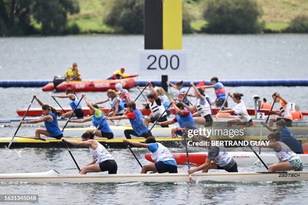 Competitors take part in a training session for the canoe discipline at the nautical stadium on the eve of the start of the ICF Canoe Slalom World...