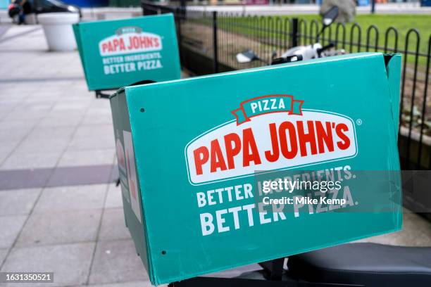 Papa John's pizza delivery courier bike boxes on 7th August 2023 in Birmingham, United Kingdom. Papa Johns is an American pizza restaurant franchise....