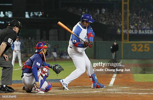 Lee Dae-Ho of South Korea bats in the sixth inning during the World Baseball Classic First Round Group B match between Chinese Taipei and South Korea...