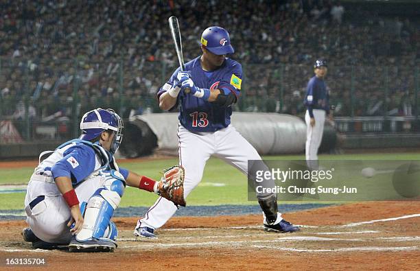 Chen Yung-Chi of Chinese Taipei bats in the fifth inning during the World Baseball Classic First Round Group B match between Chinese Taipei and South...