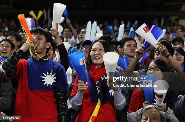 Taiwan fans cheer during the World Baseball Classic First Round Group B match between Chinese Taipei and South Korea at Intercontinental Baseball...