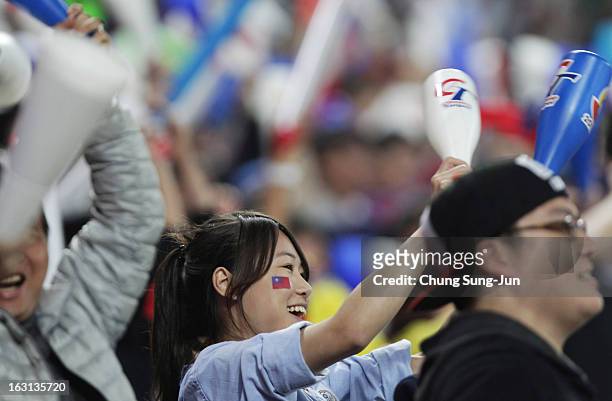 Taiwan fans cheer during the World Baseball Classic First Round Group B match between Chinese Taipei and South Korea at Intercontinental Baseball...
